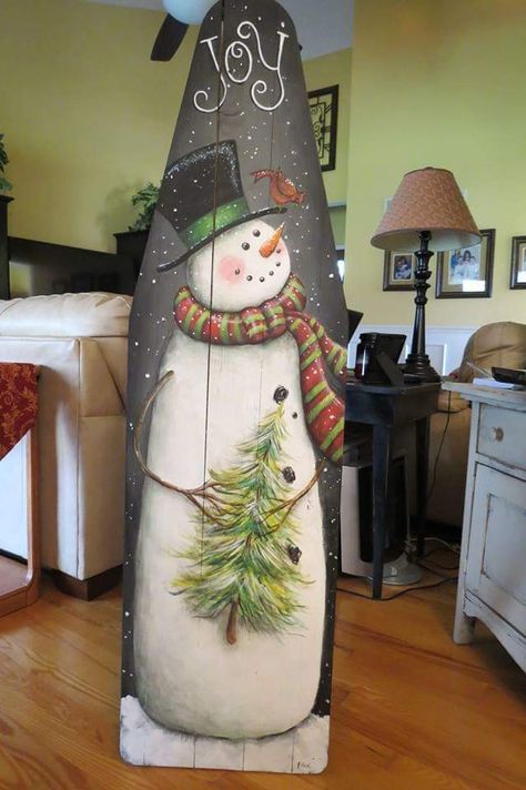 snowman painted on a wooden ironing board. Wooden Ironing Board Ideas Decor, Ironing Board Painting Ideas, Ironing Board Snowman, Painted Ironing Board Ideas, Painted Wooden Ironing Boards, Ironing Board Ideas Diy Crafts, Tole Painted Christmas Ornaments Wooden, Old Ironing Board Ideas, Painted Ironing Boards