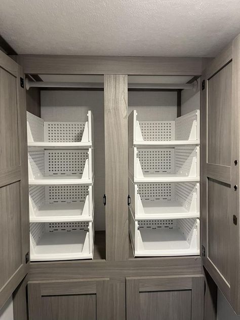 RV Storage and Organizing Ideas | Finally got my closet organizers from Amazon and I’m in love. Rv Shelves Ideas, Camper Interior Storage Ideas, Small Camper Clothes Storage, Scamp Camper Storage Ideas, Trailer Ideas Organizing, Rv Cleaning Supply Storage, Rv Closet Shelves, Clothes Storage Camper, Camper Drawer Organization