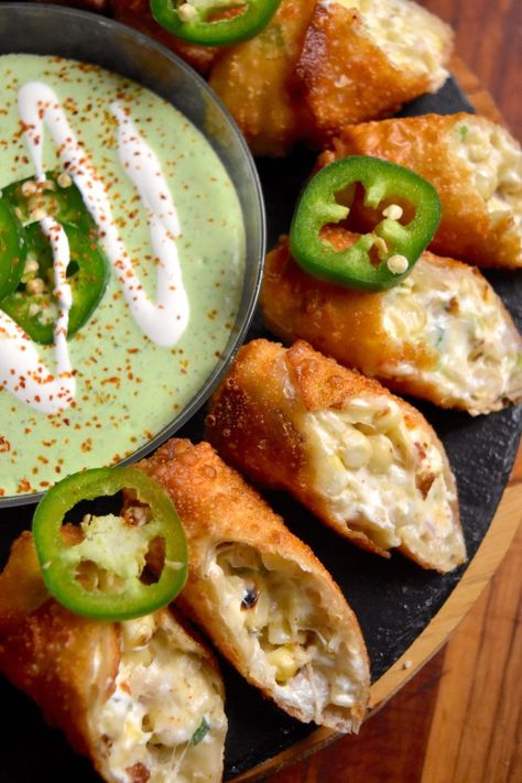 Crispy and Cheesy Elote Egg Rolls With Avocado Sauce - Sauced Up! Foods Easy Egg Rolls, Sauced Up Foods, Picky Bits, Egg Roll Recipes, Avocado Sauce, Street Corn, Finger Food Appetizers, Egg Rolls, Yummy Appetizers