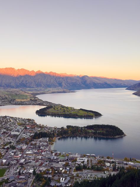 Photo: Skyline  Queenstown, New Zealand  Queenstown is a top travel destination due to its stunning natural beauty, offering a backdrop of majestic mountains and pristine lakes. It's renowned for adrenaline-pumping activities like bungee jumping and skydiving, as well as world-class skiing in winter. The town itself is vibrant, with a bustling dining scene, charming cafes, and eclectic boutiques. Additionally, its proximity to renowned vineyards makes it a haven for wine lovers. Whether seeking adventure or relaxation, Queenstown offers an unforgettable experience in one of the world's most picturesque settings. Queenstown In Winter, Queenstown New Zealand Aesthetic, Queenstown New Zealand Winter, Queenstown Skiing, Queenstown Winter, New Zealand Queenstown, New Zealand Winter, Queenstown New Zealand, Milford Sound