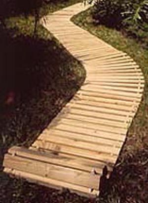 You can lay down a walkway with up to a 45 degree curve or buy an add-on 90 degree turn.  Also available are mats and decks. Wooden Fencing, Wood Walkway, Backyard Walkway, Wooden Walkways, Garden Walkway, Have Inspiration, Garden Path, Wooden Decks, Olive Garden