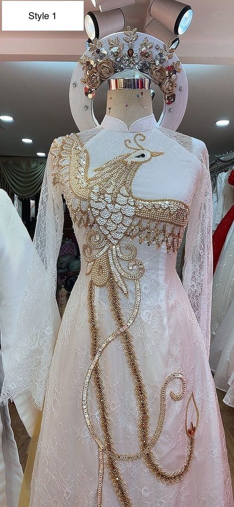 Beautiful traditional Vietnamese Ao Dai made to fit your measurements! Choose between 2 styles: - White with gold beaded phoenix & dragon patterns - Style 1 has floral lace underlay - Style 2 has glitter underlay - Price include pants for the bride's Ao dai The dress will need 2-3 weeks to be made. Please send us your body measurements (see last image) after payment. For peace of mind, photos of your dress before shipment can also be sent. Faster shipping available as an upgrade at checkout. Phoenix Style Outfits, Gold And White Clothes, Ao Dai Pattern, Ao Dai Aesthetic, Phoenix Outfits, Phoenix Goddess, Royale Outfit, Skyrim Aesthetic, Vietnamese Wedding Ao Dai