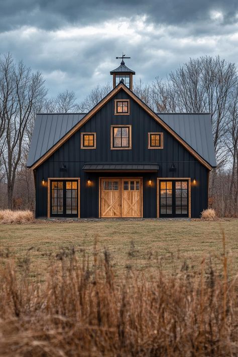 40 Amazing Converted Barn Homes That Once Were Old Barns Black Barndo With Wood Trim, Barndo Farmhouse Plans, Farm House Ideas Architecture, Barn Shop With Living Quarters, 3 Story Barndominium, Black House Copper Roof, Dark Farmhouse Interior, Barn Exterior Colors, Metal Barns Exterior