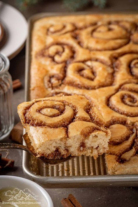 The easiest cinnamon roll pancake recipe ever! Make a giant, fluffy cinnamon roll pancake in sheet pan, then serve with cream cheese icing. Cinnamon Roll Pancakes Easy, Pancakes With Cinnamon, Cinnamon Roll Pancakes Recipe, Flap Jacks, Fluffiest Cinnamon Rolls, Cinnamon Swirls, Sheet Pan Pancakes, Oven Pancakes, Pan Pancakes