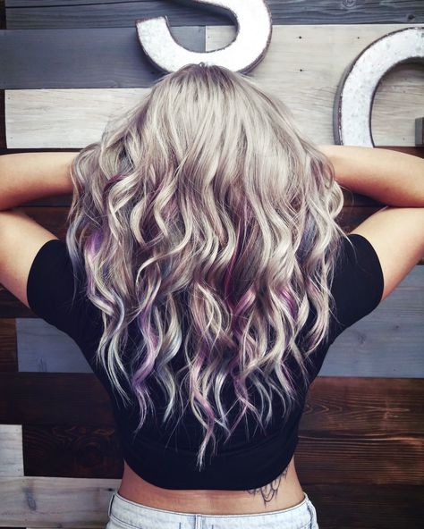 Blonde Purple Peekaboo, Blonde Hair Color Ideas With Peekaboos, Blonde Multicolor Hair, Platinum Blonde With Color Highlights, Light Blonde Hair With Color Streaks, Colorful Hair Underneath Blonde, Purple Blue And Blonde Hair, Blonde Highlights With Color Streak, Blonde Balayage With Pops Of Color