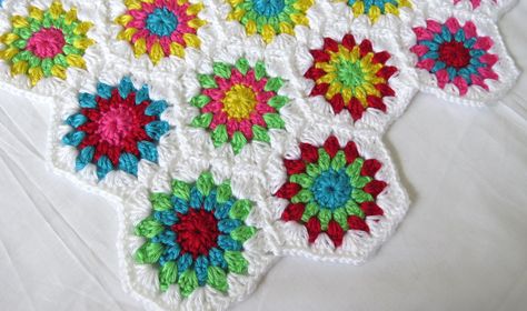 This past week I have been working on this super colorful crochet blanket. It has 5 colors and joining in white. After creating random squares on random granny square generator, I made all the rou... Random Granny Square, Hexagon Crochet Blanket, Colorful Crochet Blanket, Hexagon Blanket, Hexagon Crochet, Blanket Ideas, Crochet Blanket Afghan, Colorful Crochet, Crochet Hexagon