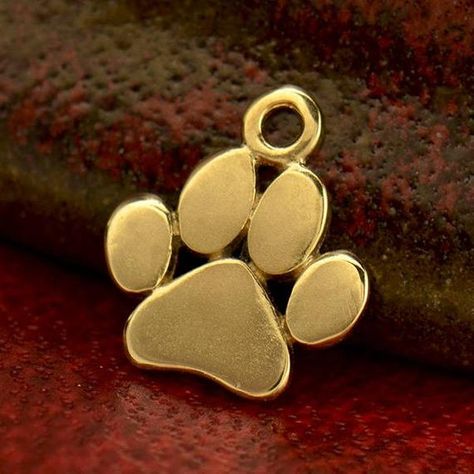 Solid 14K Gold - Paw Print Charm without a Jump Ring. Weve taken our popular Paw Print Charm and removed the jump ring, making it easier for wire wrapping projects such as earrings and lighter in weight for ease of wearing. But dont worry, if you prefer to have a jump ring to make a simple necklace, Dog Paw Bracelet, Tiny Paw Print, Puppy Paw Prints, Paw Print Necklace, Paw Print Charm, Cat Paw Print, Ring Making, Tiny Charm, Dog Paw Print