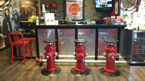 Fire hydrants stool Firefighter Bar, Training Center Design, Fire Dept Decor, Firefighter Man Cave, Fire Department Decor, Firefighter Room, Industrial Ideas, Home Bar Ideas, Wainscoting Wall