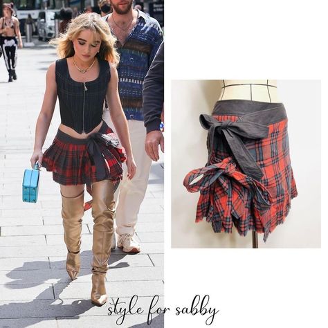 SabrinaCarpenter wore @VivienneWestwood’s Corset in blue (price varies based on where it’s bought) and their Red Label Deformed Rolled Flared Skirt, @StuartWeitzman Ultrastuart 110 Stretch Boot in Gold (unavailable in gold), @BrandonBlackwoodNYC Mini Kendrick Trunk in metallic blue (the metallic version isn’t online) and the @LauraLombardi Gemma Brass Necklace ($185) Flair Skirt, Vivienne Westwood Red, July 5th, How To Stretch Boots, Red Label, Brass Necklace, Metallic Blue, Flared Skirt, Vivienne Westwood