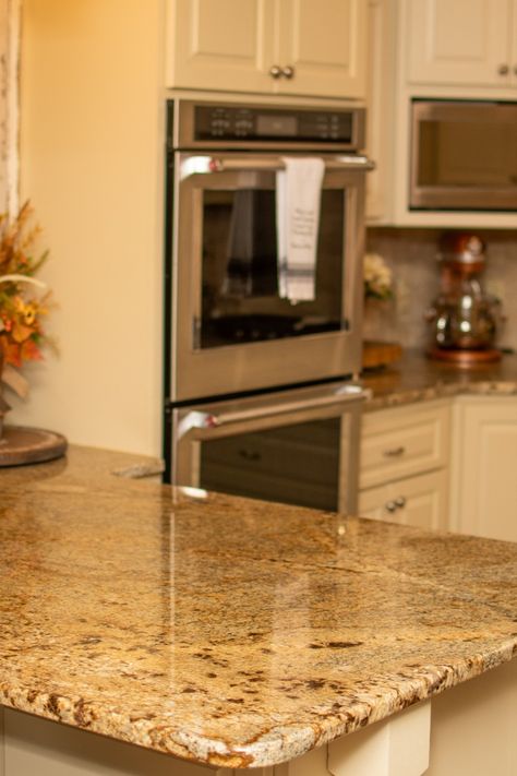 Golden Crystal Granite complimented with travertine backsplash creating a timeless look.
#GoldenCrystalgranite #GoldenCrystal #Granite #Kitchen #Countertops Golden Granite Countertops, Granite Kitchen Countertops, Conway Arkansas, Brick Backsplash Kitchen, Granite Quartz Countertops, Travertine Backsplash, Golden Crystal, Kitchen Layout Plans, Brick Backsplash