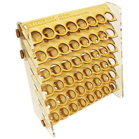 PRICES MAY VARY. Take control of your paint collection with this LITKO acrylic and MDF Paint Rack. Designed for 18mL dropper bottle paints. This craft paint storage rack contains 48 holes that are 26mm (1.02 inch) in diameter. Rack Measures11” wide, 11.5” tall, but only 4.75” deep. Precision-cut compartments designed for 26mm (1.02 inch) diameter craft paint bottles. Compatible with any 26mm round dropper bottle paint brands like Vallejo, Army Painter, AK Interactive, Green Stuff World, AMMO by Paint Organizer, Paint Holder, Design Shelves, Bottle Paint, Craft Paint Storage, Paint Bottles, Unique Shelf, Bottle Shelf, Paint Rack