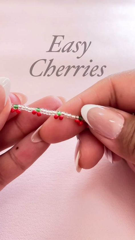 Beaded cherries tutorial🍒 @Jasmin #beads #beadedjewelry #diyjewelry #... | seed bead bracelet | TikTok Cherry Bracelet Tutorial, Seed Bead Patterns Tutorials, Cherry Seed Bead, Cherry Bracelet, Making Bracelets With Beads, Making Bracelets, Seed Bead Patterns, Seed Bead Bracelet, Michael Store