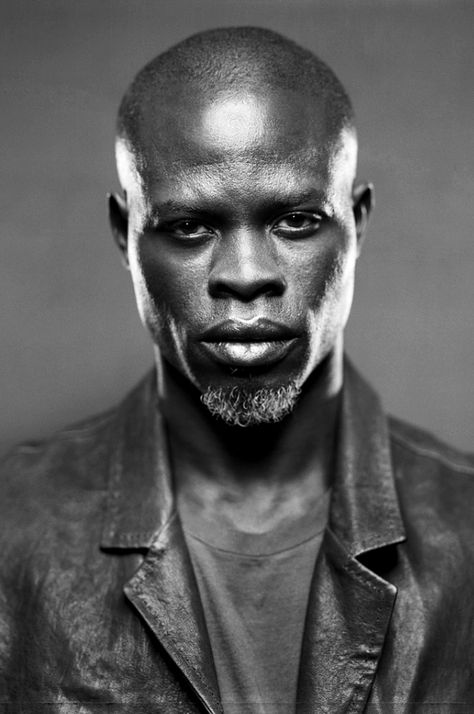 Djimon Hounsou. Not my usual handsome guy but there is something about him I just like. Djimon Hounsou, Photo Star, Black Actors, Actors Images, Poses References, Celebrity Portraits, Black Man, Black And White Portraits, Male Portrait