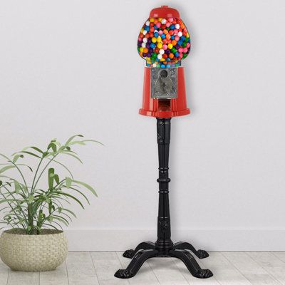 The Vintage Gumball Machine with Stand comes with a durable metal base, real glass globe, and all the vintage charm of the 1920’s this replica was designed from. Equipped with an innovative dispensing mechanism that is adjustable, this candy machine dispenser allows you to vary the volume of 0.62-inch diameter gumballs, nuts, jellybeans, or candy that is dished out when you turn the handle. It also has a unique anti-spill cover that helps keep your treat in the tray and not on the floor. This ki Antique Gumball Machine, Hangout Area, Vintage Gumball Machine, Gumball Dispenser, Quirky Furniture, Gum Machine, Bling Makeup, Bubble Gum Machine, Gumball Machines