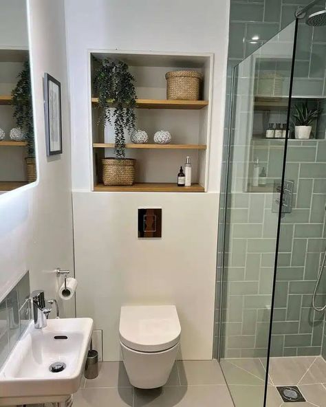 I love how the shelves are recessed into the wall, creating a sleek and seamless look! Image credit: INSTAGRAM @PEBBLEGREYUK Recessed Shelves Bathroom, Shelves Behind Toilet, Recessed Wall Shelves, Recessed Storage, Downstairs Wc, Recessed Shelves, Bathroom Shelves Over Toilet, Oak House, Toilet Shelves