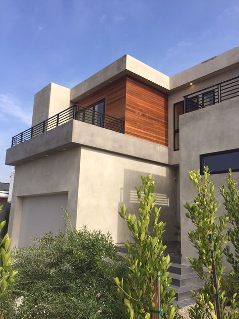 Smooth Stucco. Light Grey. Wood Trim. Grey Stucco House Exterior, Smooth Stucco, 70s Architecture, House Finishes, Newport House, Stucco Siding, Mid Century Modern Exterior, Exterior Finishes, Townhouse Exterior