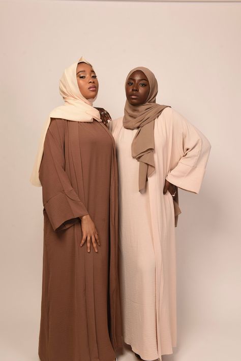 Our Lea Set is the most comfortable abaya you'll ever wear. Made from lightweight linen blend fabric that is very suitable for warm weather. Comes in various colors that you can mix & match  DETAILS: Set includes a sleeveless inner dress + long sleeve open abaya + belt  Fabric: linen + polyester blend Unlined  SIZE & FIT: True to size Models are 5'5" & 5'5" wearing  size M & size L respectively  See size chart in the picture gallery Luxury Long Modest Abaya, Layer Abaya, Abaya On Black Women, Plus Size Abaya, Abaya Girl, Luxury Floor-length Modest Abaya, Linen Abaya, Oversized Long Sleeve Black Abaya, Habits Musulmans