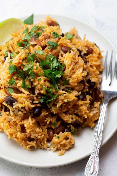 Instant Pot Rice and Beans | Made from canned beans Instant Pot Beans And Rice, Instant Pot Rice And Beans, Cuban Rice And Beans, Pinto Beans And Rice, Instant Pot Rice, Cajun Rice, Vegan Instant Pot Recipes, Seasonal Eating, Tomato Rice