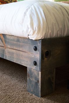 Love the base of this DIY bed! However,you do not want to use a solid piece of plywood under your mattress because a mattress needs to breathe so it doesn't mold. Salvaged Door, Door Headboard, Diy Platform Bed, Bed Platform, Diy Bed Frame, Bed Plans, Wood Beds, Diy Bed, Wooden Bed