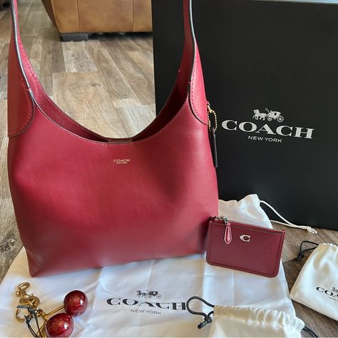 Up For Your Consideration Today Is A Brand New Tiktok Trending! Coach Brooklyn 28 In The Sold Out Ruby Color! Included Is Matching Coach Mini Skinny & Cherry Bag Charm. This Is The "It" Bag Of The Season, Absoulutly Stunning! This Coach Brooklyn 28 Shoulder Bag Is A Stylish Addition To Any Outfit. With A Solid Pattern And Magnetic Snap Closure, This Medium-Sized Bag Is Perfect For Everyday Use. The Exterior Is Made Of Beautiful Leather In A B4/Ruby Color, While The Interior Lining Is Also Made O Vintage Coach Bags Red, Coach Brooklyn 28, Coach Brooklyn, Cherry Bag, Fancy Things, Ruby Color, It Bag, Vintage Coach Bags, Medium Sized Bags