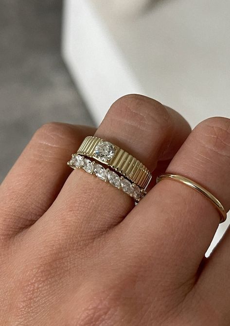 Our take on an elegant classic—the Marquise Eternity Ring shines bright and bold, featuring diagonally set marquise cut diamonds. 14k solid yellow gold—always Average weight: 2.8g Band width: 3.4mm Height off of finger: 2.2mm Diamond 4 C's: 1.9ctw, but may vary depending on ring size, Marquise, VS1-2, D/E/F, Excellent Custom sizing is available. Custom sized pieces are final sale. This piece cannot be resized. This piece is made to order. Please allow at least 10-15 business days for production. Fall Rings, Marquise Shape Diamond, Soft Edges, Fancy Jewellery Designs, Twist Ring, Broken Chain, Solid Gold Jewelry, Eternity Ring Diamond, Domed Ring