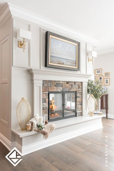 Custom white cabinetry handcrafted for a fireplace mantel. White Molding Fireplace, Stone Fireplace With Crown Molding, Crown Molding Fireplace, Traditional Crown Molding, White Fireplace Mantel, Fireplace Molding, White Fireplace Mantels, Traditional Fireplace Mantel, Molding Detail