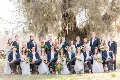 Blue and gray wedding party. gray bridesmaids dresses. Navy blue groomsmen suits. Large bridal party. Dog in bridal party. Bridal party poses. Wedding party portraits. Wedding party sitting down. Navy Blue Groomsmen Suits, Gray Bridesmaids Dresses, Blue And Gray Wedding, Wedding Photography Poses Bridal Party, Navy Blue Groomsmen, Gray Wedding Party, Large Bridal Party, Large Wedding Party, Blue Groomsmen Suits