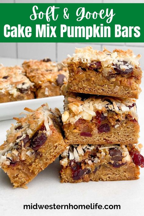 Pumpkin Bars with cake mix are soft and chewy with layers of gooey pumpkin-spiced sweetened condensed milk, pecans, cranberries, white and dark chocolate chips, and flaky coconut. Delicious fall dessert that starts with a handy box of cake mix! Pumpkin Magic Bars, Yellow Cake Mix Recipes, Pumpkin Magic, Easy Bar Recipes, Magic Bars, Pumpkin Bars, Vegetarian Cake, Yellow Cake, Cake Mix Recipes