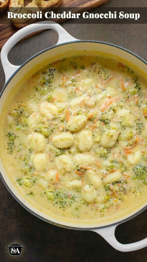 Overhead view of Broccoli Cheddar Gnocchi Soup in a large white Dutch Oven. Broccoli Cheese Gnocchi Soup, Broccoli Cheddar Gnocchi Soup, Gnocchi And Broccoli Recipes, Soup Recipes Gnocchi, Brócoli Cheddar Soup, Orecchiette Soup, Gnocchi Soup Recipes, Carrot Potato Soup, Potato Cheddar Soup