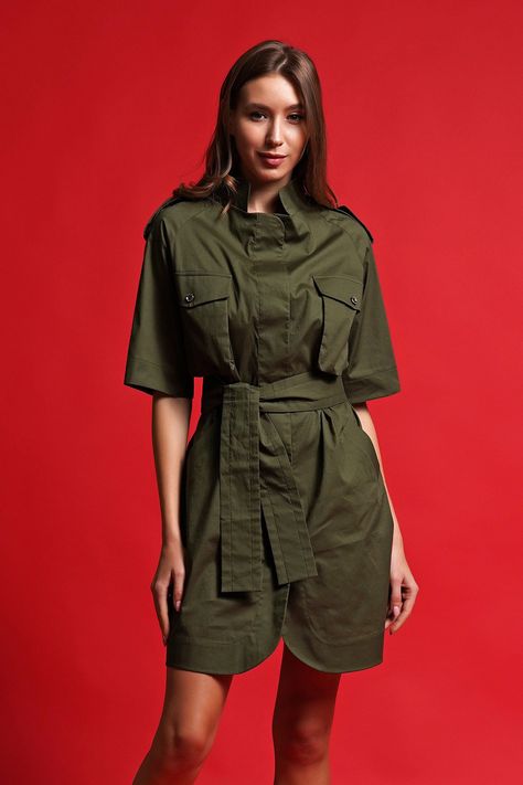 "A simple khaki dress featuring military style, mini length and high neck collar. -  minimalist military design   - stand collar (high neck) -  shift silhouette -  mini length -  half sleeves -  matching fabric belt -  safari style -  two large pockets at chest -  two pockets at side hip  Fiber: cotton 95%, elastane 5% Color: khaki For size S: length- 34\"(87cm) Our model wears a 06 size and is 176cm/5'7\" tall You may feel free choosing the size. Just send us your measurements (bust, waist, hip Avant Garde Dress, Army Dress, Avant Garde Dresses, Utility Dress, Stand Collar Dress, Military Dresses, Safari Dress, Safari Chic, Dress High Neck