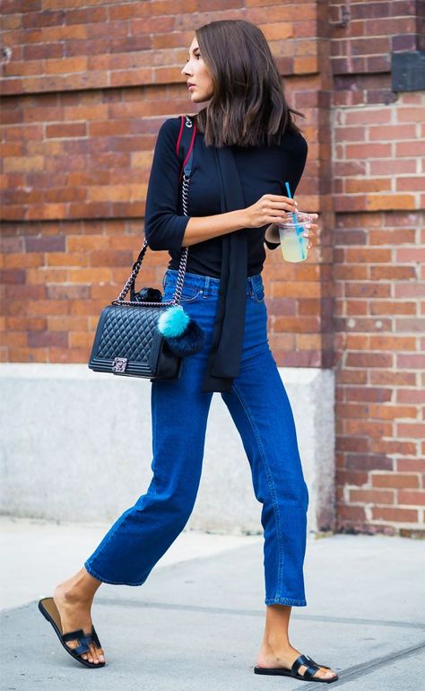 Sandal trends 2017: Hermes's Oran sandals are always a chic choice when it comes to summer fashion—here they are styled with a simple cropped flared jean and black top combo. Chic. Chanel Street Style, Style Désinvolte Chic, Jeans Trend, Street Style 2016, Trending Sandals, Looks Street Style, Street Style Summer, Street Style Chic, Looks Chic