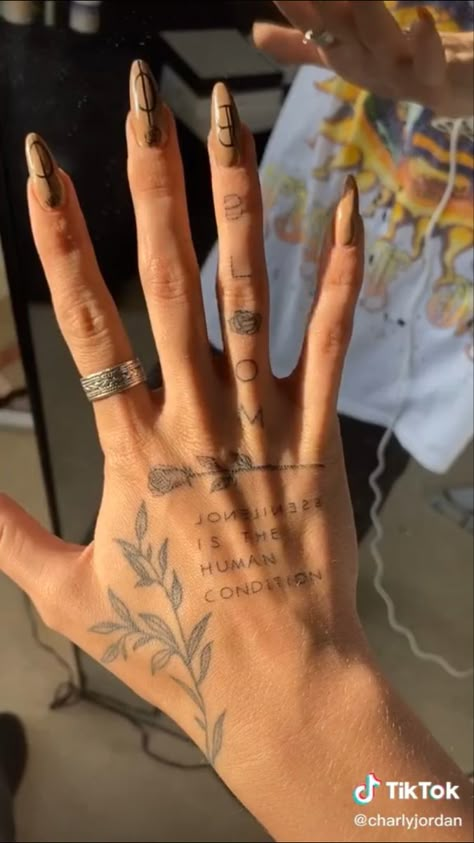 Small Hand Tattoos Writing, Lower Thumb Tattoos, Small Hand Tattoos For Women Words, Imagination Tattoo Ideas, Hand Sleeve Tattoo Women, One Word Hand Tattoos, Hand Tattoos Big, Little Hand Tattoos For Women, Demi Lovato Hand Tattoo