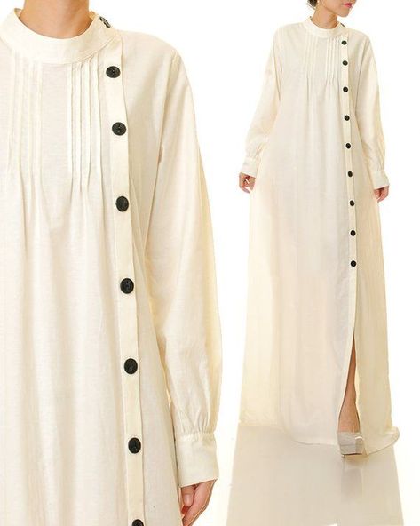 d82118376df344b0010f53909b961db3desc39572851ri Modest Sundress, White Abaya, Mandarin Collar Dress, Button Up Maxi Dress, Muslim Fashion Dress, Abaya Designs, Cotton Shirt Dress, Long White Dress, Designs For Dresses