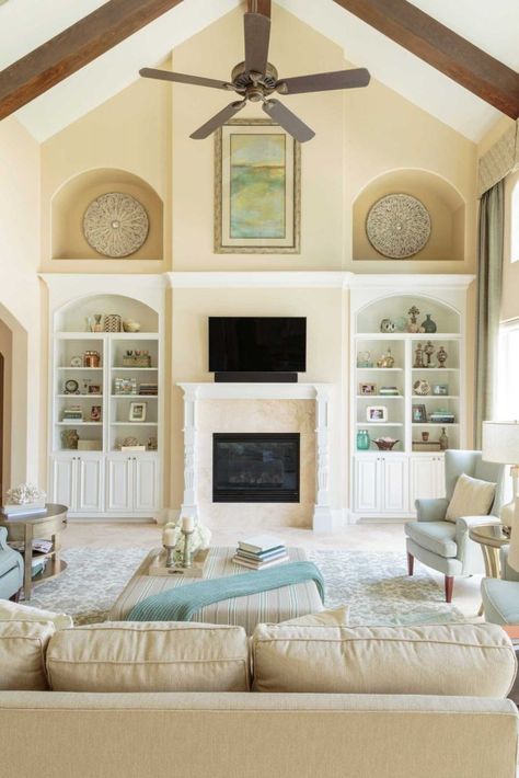 Keep a sense of scale with your rugs. If the living room is large, like this one in Katy, a small rug will likely look a bit off. Sherwin Williams Irish Cream, Furnitur Ruang Keluarga, House Of Turquoise, Traditional Living Room, Irish Cream, Girl House, Sherwin Williams, Luxury Interior Design, Home Interior