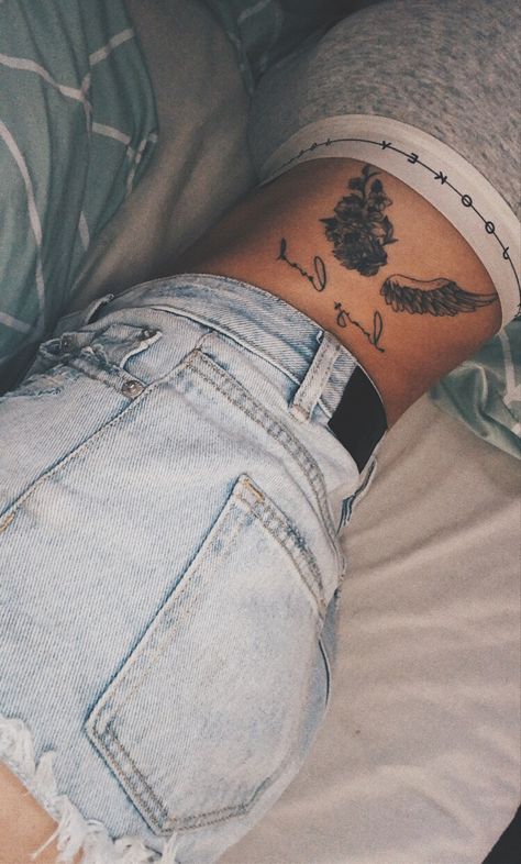 Rid Tattoo Women, Wings On Ribs Tattoo, Big Memorial Tattoos, Tattoo Ideas Female Meaningful Ribs, Tattoos For Ribs, Angel Wings Below Knee Tattoo, Still Standing Tattoo, Western Rib Tattoos For Women, Angel Tattoo On Ribs