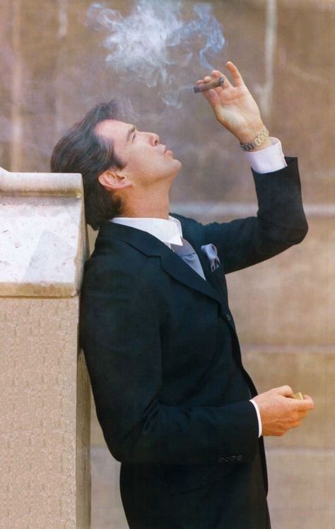 Celebrity Cigar Smokers Pierce Brosnan #smoking #cigars #lighters Pierce Brosnan 007, James Bond Style, A Man In A Suit, Man In A Suit, 007 James Bond, Cuban Cigars, Good Cigars, Roger Moore, Cigars And Whiskey