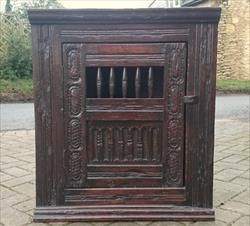 Unusually fine quality early oak antique hanging corner livery cupboard. This antique corner cupboard has an open spindle section to the front door and molding and carved detail all around. This piece must have been in regular use for many years. It has built up a wonderful level of patination in all that time and the back panels and shelf have been replaced at some point in its history.   English 17th century £850   13" / 33cm deep 24" / 61cm wide 27" / 69cm high Victorian Architecture Interior, Medieval Furniture, Corner Cupboard, English Furniture, Victorian Architecture, Oak Furniture, 17th Century, Antique Style, Plymouth