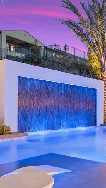 Pool Water Wall, Pool With Rain Curtain, Pool With Lights, Swimming Pool Feature Wall, Floating Pool Lights, Swimming Pool Lights, Led Pool Lighting, Outside Pool, Courtyard Pool