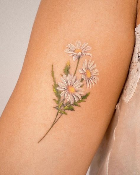 25 Delicate Daisy Tattoo Ideas To Save For Inspiration Black Daisy Tattoo, Delicate Daisy Tattoo, White Daisy Tattoo, Daisy Tattoo Ideas, Daisy Tattoo Meaning, White Daisy Bouquet, Daisy Chain Tattoo, Daisy Tattoos, White Flower Tattoos