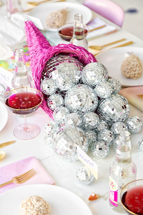 Throwback! | 5 Colorful Ideas for a Throwback Thanksgiving | Studio DIY® Retro Thanksgiving Decor, Colorful Thanksgiving Decor, Disco Ball Centerpiece Table Decorations, Disco Ball Tablescape, Disco Thanksgiving, Colorful Thanksgiving Table, Colorful Disco Party, Disco Ball Centerpiece Ideas, Disco Dinner Party