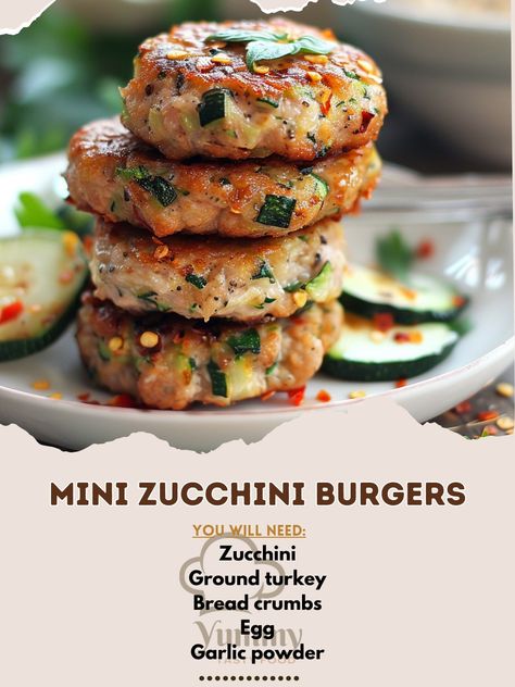 🍔🌱 Mini Zucchini Burgers are here to steal the show! Healthy, tasty, and oh-so-satisfying! #VeggieDelight Mini Zucchini Burgers Ingredients: Zucchini, grated (2 cups (300 g)) Ground turkey (1 lb (450 g)) Bread crumbs (1/2 cup (60 g)) Egg (1) Garlic powder (1 tsp (5 g)) Salt and pepper to taste Mini burger buns (10) Instructions: Combine zucchini, turkey, bread crumbs, egg, garlic powder, salt, and pepper. Form into small patties and fry until golden. Serve on mini buns. 🍴🥒 Perfect for par... Turkey Bread, Zucchini Burgers, Mini Burger Buns, Zucchini Burger, Mini Bun, Mini Burger, Mini Burgers, Veggie Delight, Burger Buns