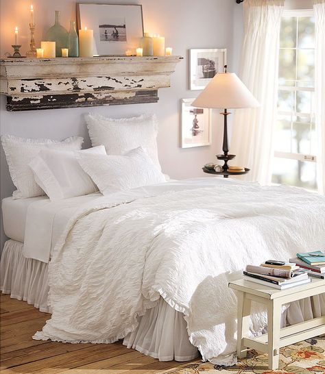 Too feminine, but the re-purposed wood with candles and white linens with a table at the base of the bed are ideas. Creative Headboards, Barn Bedroom, Shelf Above Bed, Creative Headboard, Bedroom Colours, Blanket Decor, Over The Bed, White Bed, Shelves In Bedroom