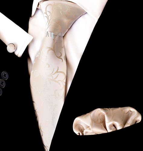 "This finely crafted champagne tie and pocket square set will add a touch of class to your formal attire with its gold vine design pattern. Do you have champagne wedding décor? This tie set will be perfect for the groom and groomsmen.  Looking for the matching vest that automatically includes this set? Click here: https://www.etsy.com/listing/1452981248/mens-formal-vests-champagne-gold-vine  Dimensions and care: *(self tie) Tie: 3\"W x 59\"L *Pocket Square: 8.5\" square *Hand wash only, warm iro Groomsmen Champagne Tie, Groomsmen Attire Gold, Tan Tux Wedding, Champagne Suits For Men, Tux With Suspenders, Champagne Groomsmen Attire, Champagne Tux, Black And Champagne Wedding, Groomsmen Colors