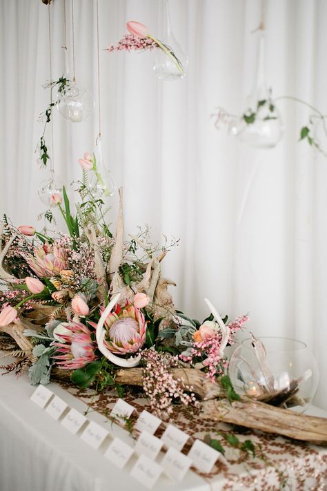 Antlers and king protea | Kristyn Hogan Photography | see more on: http://burnettsboards.com/2014/09/rustic-refined-driftwood-wedding-inspiration/ Driftwood Wedding, Protea Wedding, Beach Wedding Centerpieces, Rustic Wedding Table, Beach Wedding Decorations, Wedding Day Inspiration, Black Book, Desert Wedding, Wedding Table Settings