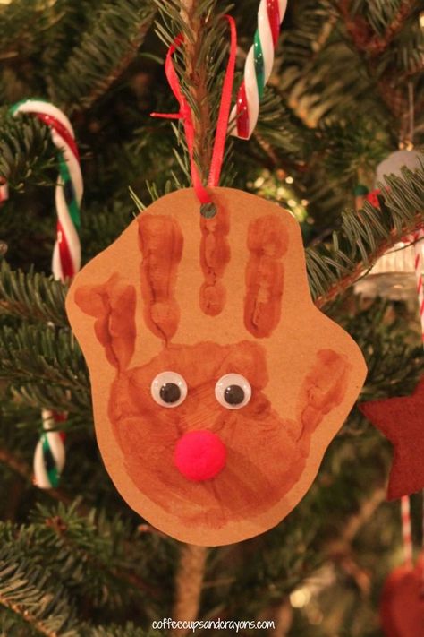 Reindeer Handprint Ornament Handprint Reindeer, Baby Christmas Crafts, Ren Geyiği, Reindeer Handprint, Handprint Ornaments, Christmas Crafts For Toddlers, Preschool Christmas Crafts, Paint On Paper, Christmas Crafts For Kids To Make