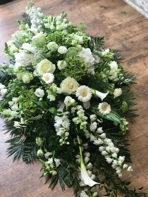 With Sympathy. One of our most popular choices is a classic coffin top spray in white flowers with beautiful foliage. Size, style and flower content chosen and made specifically to your needs. Get in touch if you would like to discuss florals for your loved one's funeral. #withrespect #funeralflowers #withsympathy #flowersforfunerals #flowersforlovedones #lovedones #sympathyflowers White Flowers With Greenery, Coffin Spray, Flowers With Greenery, With Sympathy, Sympathy Flowers, Flower Tops, Love Flowers, Celebration Of Life, White Flowers