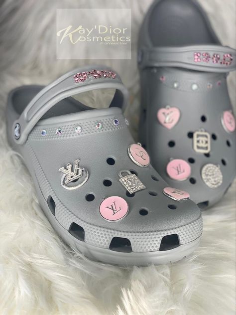 grey crocs Croc Business, Grey Crocs, Crocs Custom, Cool Crocs, Crocs With Jibbitz, Crocs Aesthetic, Crocs With Charms, Crocs Collection, Bedazzled Shoes Diy