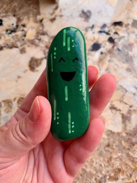 Pickle rock Pickle Rick Painting, Painted Pickle Rocks, Cucumber Rock Painting, Rock Painting Pickle, Pickle Painted Rock, Food Painted Rocks Ideas, Rock Painting Food Stones, Stone Exterior Houses, Rock Aesthetic