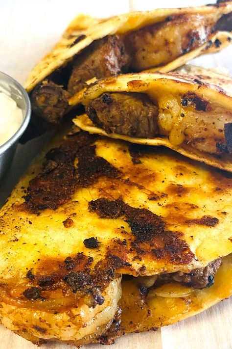 quesadilla pieces with shrimp and steak Steak And Shrimp Quesadilla, Steak And Shrimp Tacos Recipe, Surf And Turf Burrito Recipe, Quesadilla Maker Recipes, Shrimp Quesadilla Recipe, Shrimp Quesadilla, Steak Taco Recipe, Shrimp Taco Recipes, Steak And Shrimp