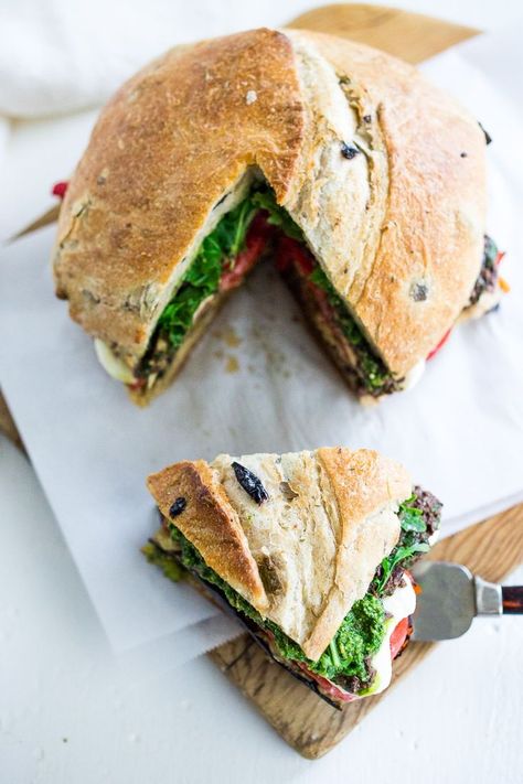 Grilled Eggplant Muffuletta Sandwich with Pesto, roasted peppers, olive tapenade and fresh mozzarella. All the flavors of summer in one bite! | www.feastingathome.com Goat Cheese Sandwich, Vegetarian Sandwiches, Muffuletta Sandwich, Vegan Sandwich Recipes, Picnic Sandwiches, Lunch Prep, Olive Tapenade, Grilled Eggplant, Yummy Mummy